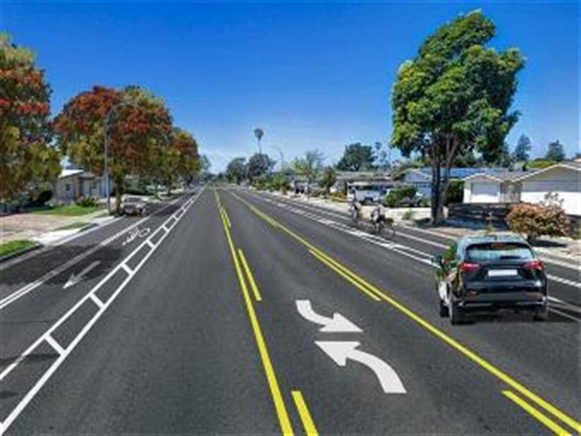 Otis Drive with center turn lane, two lanes of auto traffic, and bike lanes. 