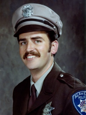 A smiling photo of Robert Davey Jr. 